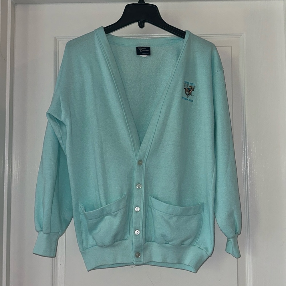 Vintage teal sweater with an embroidered “Rodeo Drive Beverly Hills” graphic.